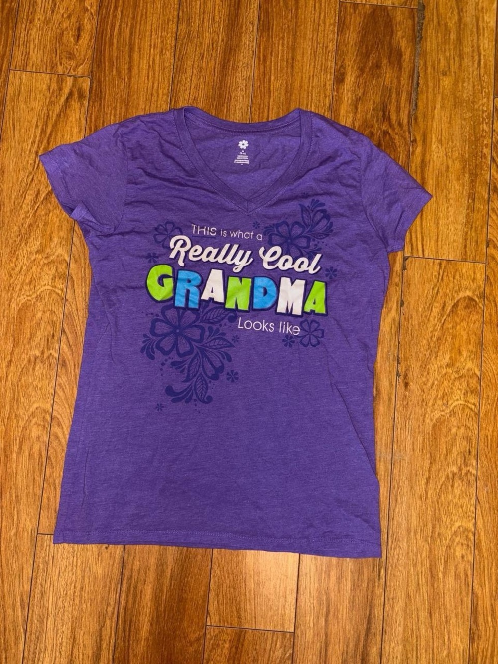 V Neck tee with floral design and “Grandma” text